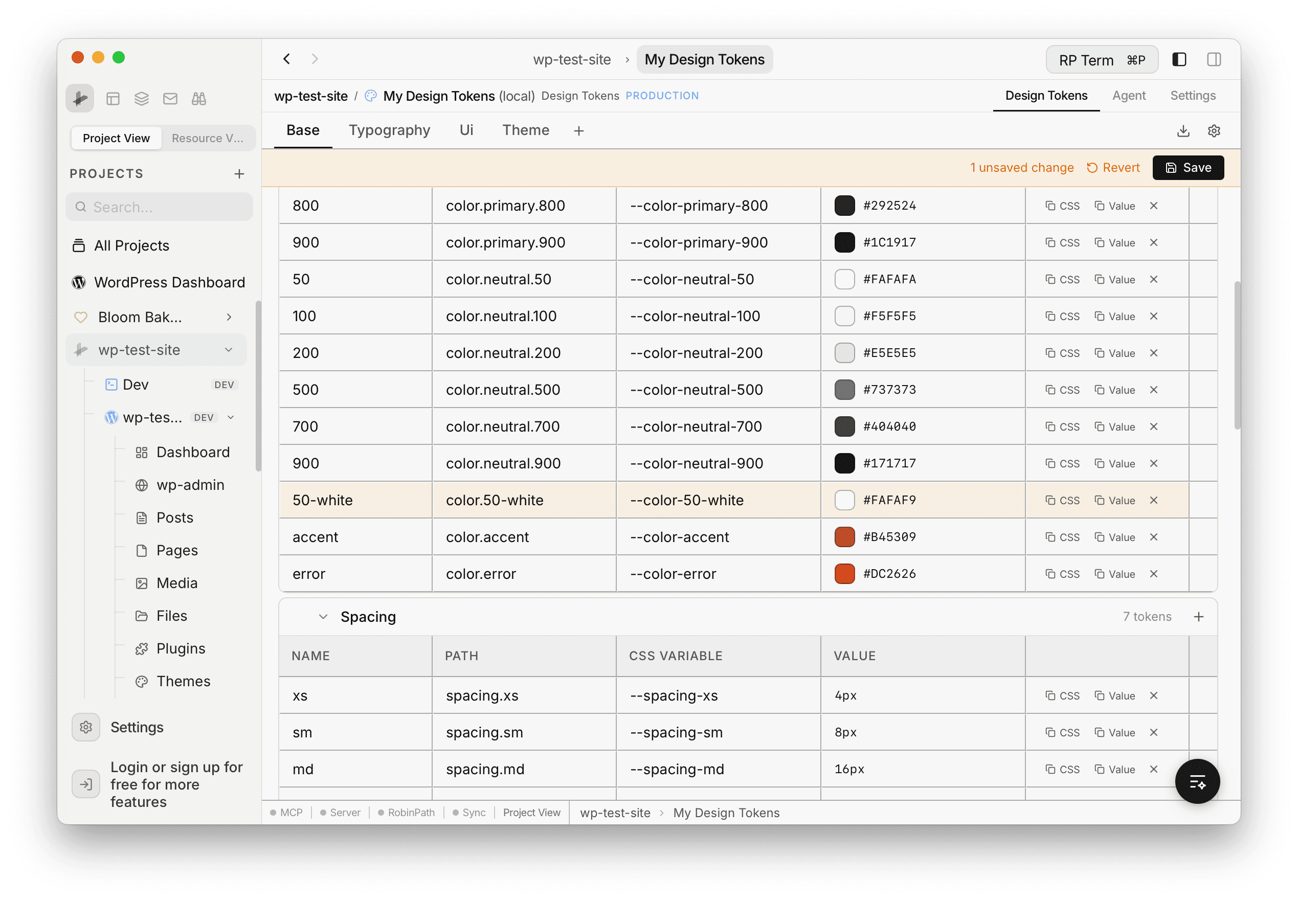 Save bar showing "1 unsaved change" with Revert and Save buttons, above the token table with a newly added token